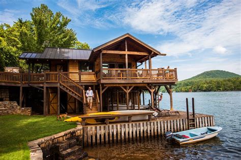 A New Wave Of Luxury Boathouses Lakefront Living House Boat Guest