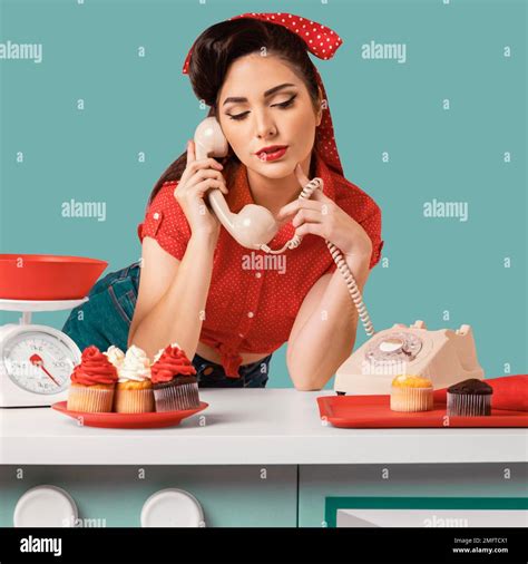 Pinup Girl Posing Kitchen Stock Photo Alamy