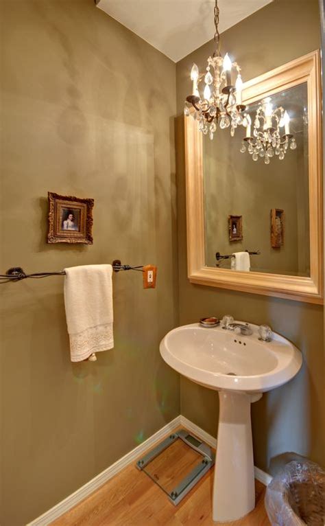 Traditional Powder Room With Pendant Light And Hardwood Floors In Boise