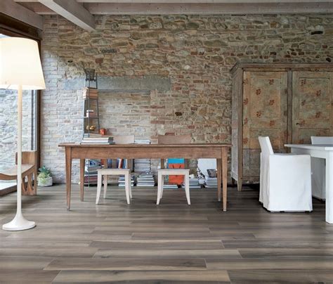 Trend Wood Look Ceramic Tile Rustic Dining Room Other By Arley