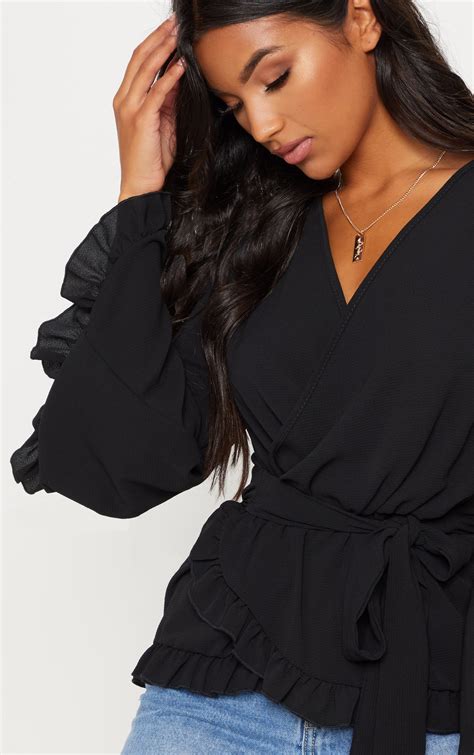 black flared sleeve frill blouse tops prettylittlething usa