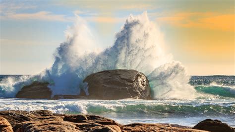 Waves crashing against rocks - The waves of the Indian Ocean crashing against the rocks of 