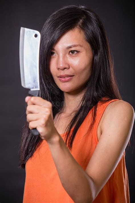 Woman Licking Kitchen Knife Stock Photos Free And Royalty Free Stock