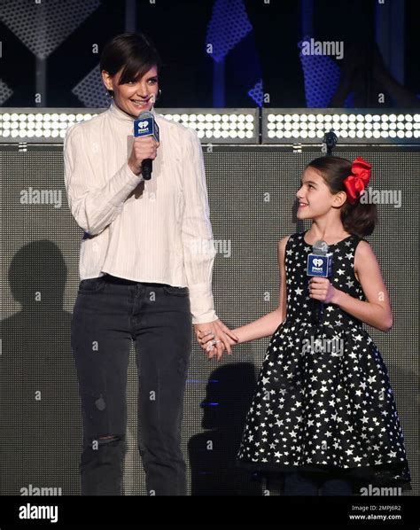 Actress Katie Holmes And Daughter Suri Cruise Introduce Taylor Swift At Z100 S Iheartradio