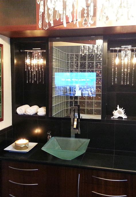 When you turn on the tv in the mirror, you can watch. Vanity Mirror TV | Vanishing Television For Your Bathroom