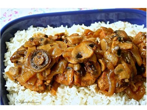 Feel free to use any of the below tags. Fall Apart Tender Pork Chops & Gravy Over Rice - Wildflour ...