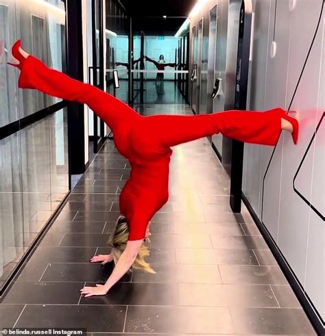Nine Host Belinda Russell Performs The Upside Down Splits In The Office Daily Mail Online