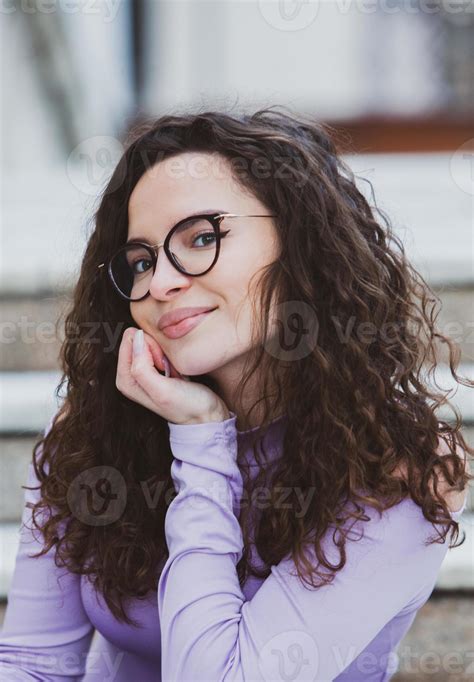 Beautiful Young Woman With Brunette Curly Hair Portrait In Eye Glasses