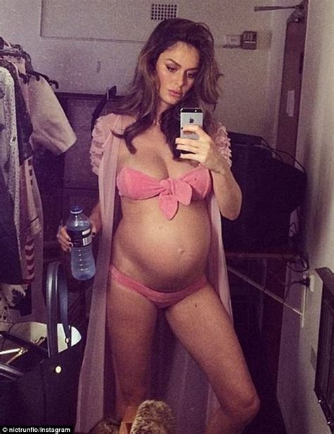 Nicole Trunfio Shows Off Her Ample Cleavage And Large Baby Bump In A