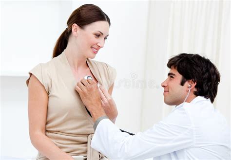 Male Doctor Examining A Female Patient Royalty Free Stock Images Image