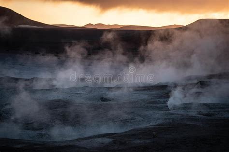 Geyser And Volcanic Lands At Sunrise Geothermal Industry Stock Photo