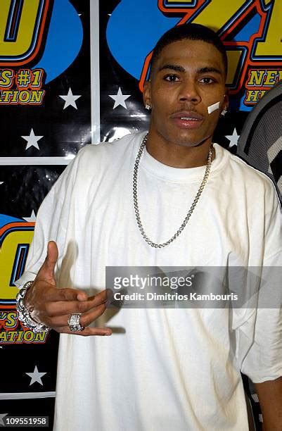 Nelly Band Aid Photos And Premium High Res Pictures Getty Images