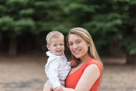 Cute Millennial Mom Holding Toddler Son Stock Photo Image Of Joyful