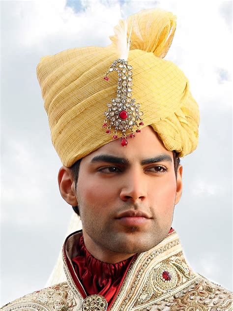 Some hindus will wear turbans and others do not; Groom Kulla Design