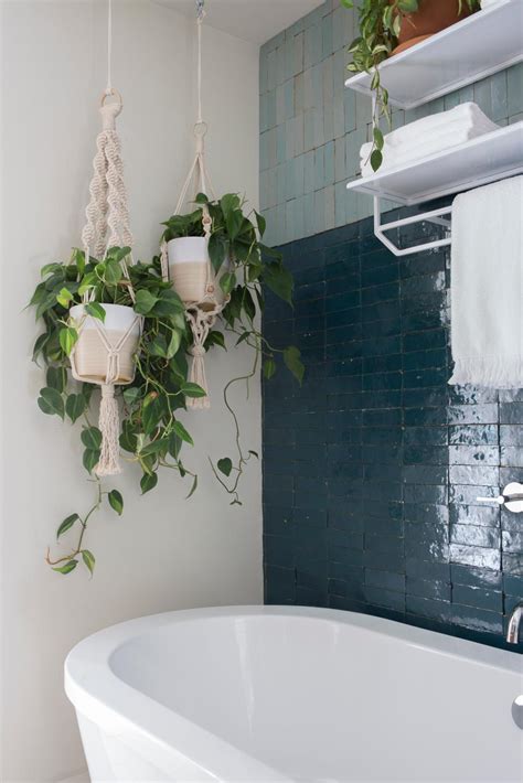White Midcentury Modern Bathroom With Blue Tile Accent