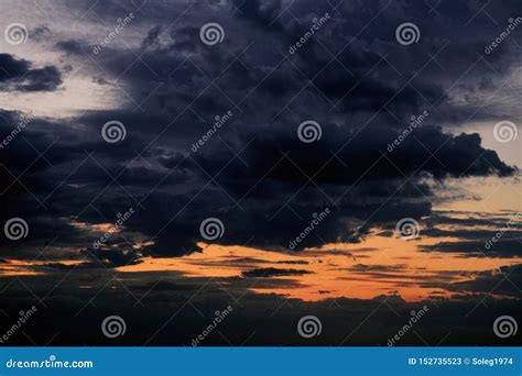 Beautiful Sunset Dark Sky With Clouds And Sunlight Stock Image