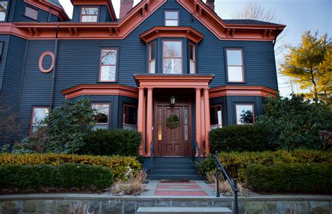 A house in their neighborhood with a similar paint job led the couple to select this cheery palette. Exterior House Painting, Exterior Painting Services Boston