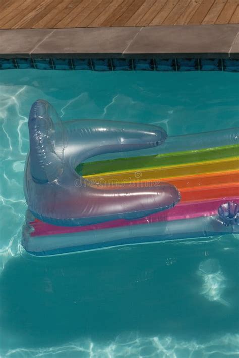 Inflatable Tube Floating In A Swimming Pool Stock Photo Image Of