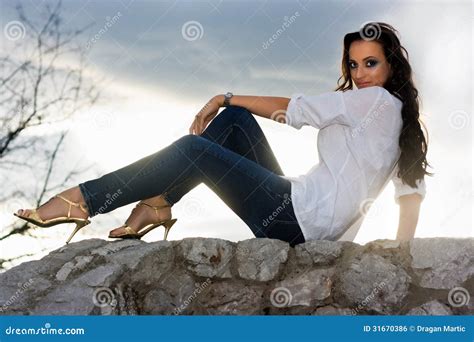 Woman Sitting On Wall Stock Photo Image Of Fashion Beautiful