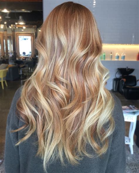 A popular color combination, strawberry blonde hair with blonde highlights can make the strawberry red tone of the hair more subtle. Strawberry blonde balayage by Mari at baroque salon Tacoma ...