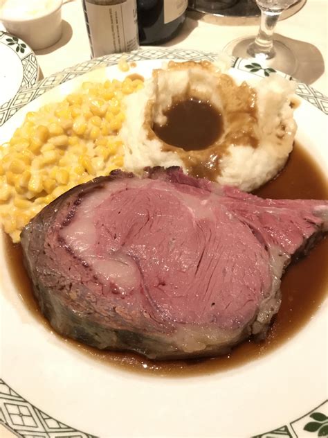 A standing rib roast is coated in a simple rosemary and dijon mixture before. i ate prime rib with creamed corn and mashed potatoes ...
