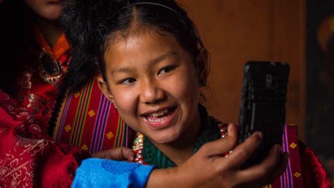 bhutanese girl bhutanese girl taking a selfie with her fam… flickr