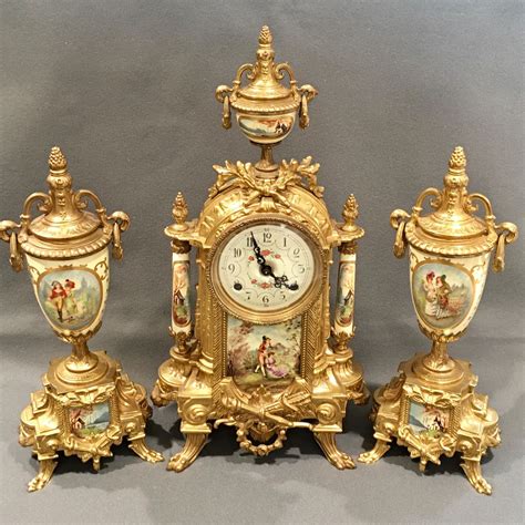 A Gilt Metal Sèrves Style Clock Garniture Decorative Antiques