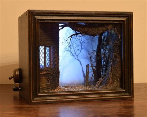 Model Maker Creates Spooky Miniature Scenes Framed Within Shadow Box
