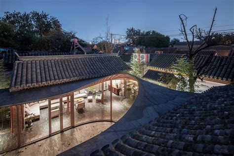 Billowing Glass Rooms Enlarge A Traditional Beijing Courtyard House