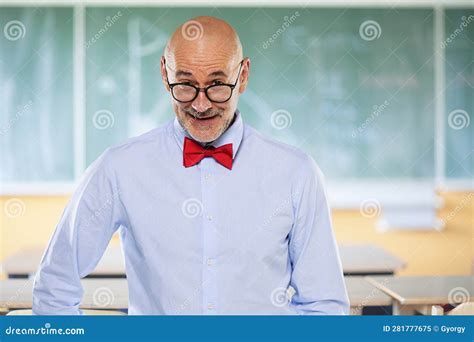 Male Teacher Standing In Front Of Chalkboard Stock Image Image Of