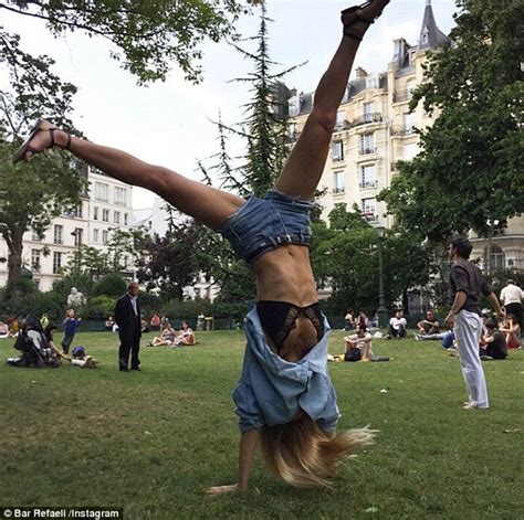 Bar Refaeli Flashes Her Lace Bra And Toned Tummy In Parisian Park Daily Mail Online