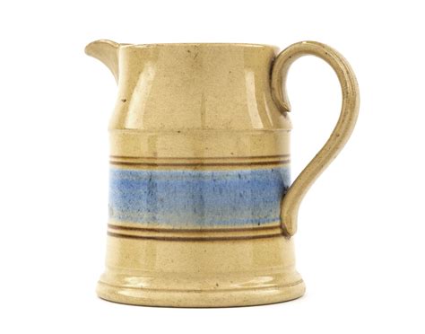 An Antique Yellow Ware Blue And Brown Banded Pitcher Artzze