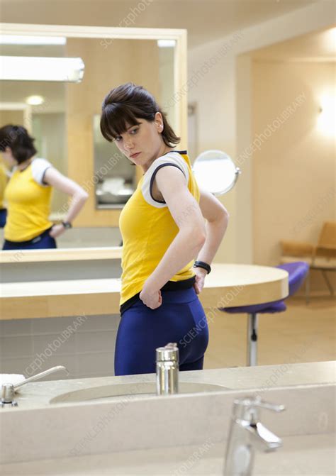 Woman Admiring Herself In Mirror Stock Image F0188559 Science Photo Library