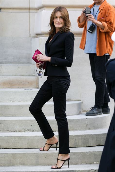 Carla Bruni Sarkozys Paris Fashion Week Wardrobe At Balmain Dior And