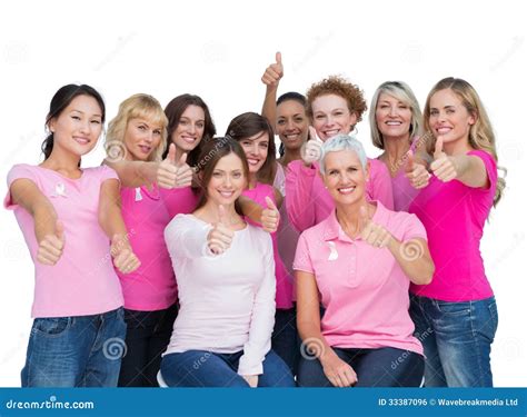 Cheerful Women Posing And Wearing Pink For Breast Cancer Stock Photo
