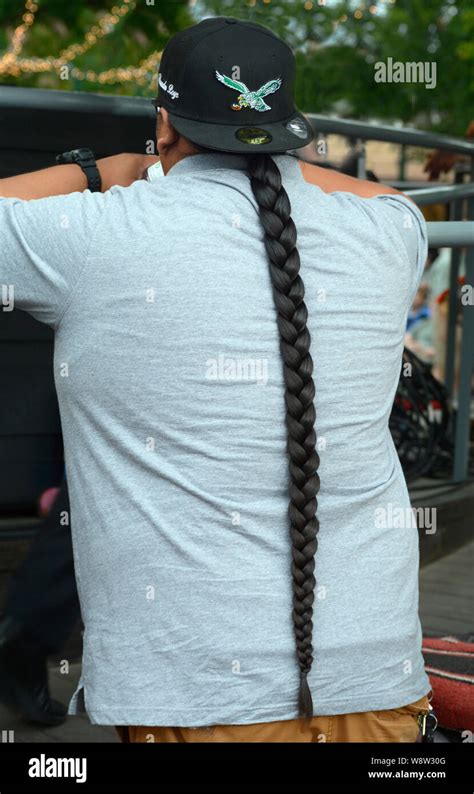 Young Native American Man With Long Braided Hairstyle Stock Photo Alamy