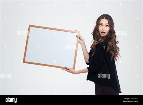 Portrait Of Attractive Young Girl Showing Blank Board Isolated On A