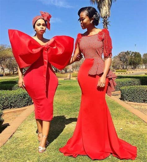 Bride And Bridesmaid In Red Shweshwe Inspired Modern Outfits 2019