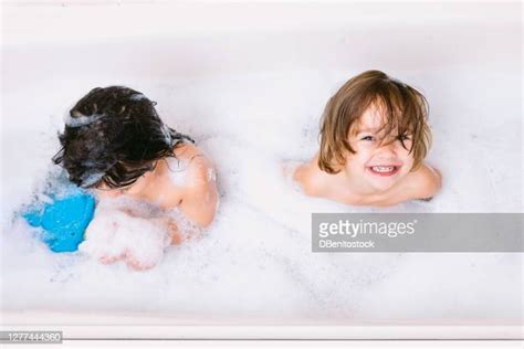 Sister Taking Shower Photos And Premium High Res Pictures Getty Images