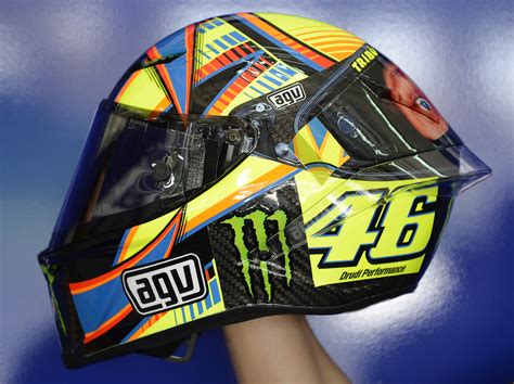 Rossi debuted the amazing the winter test 2013 double face helmet at the test at sepang for the the agv corsa winter test 2013 double face is expected to arrive in the next month from agv. New: Valentino Rossi double face AGV Corsa helmet | Visordown