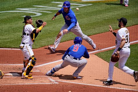 javier baez and cubs baffle pirates infielders in wild play the new york times