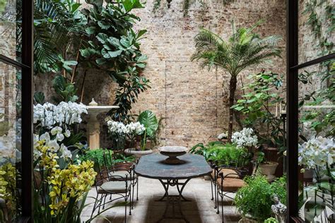 London Based Interior Designer Rose Uniackes Indoor Garden Courtyard