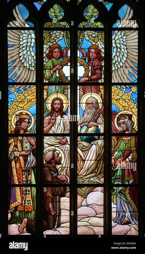 The Holy Trinity Stained Glass Window In Saint Barbaras Church In