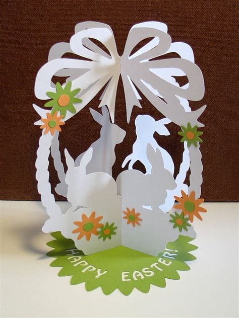 an easter card made out of paper on a table