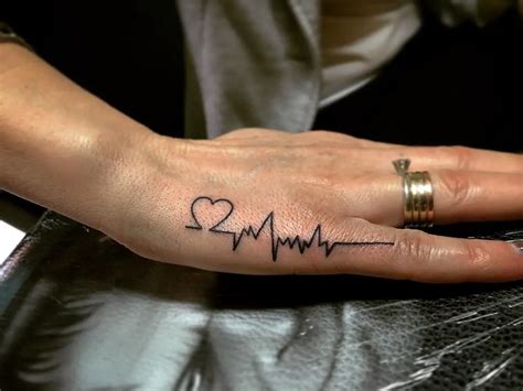 50 Popular Ideas Hand Tattoo Heart
