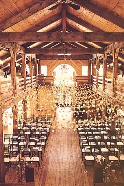 Discover a rustic wedding ceremony in a barn and a tent reception at a the bride's parents' farm in ohio. Mapleside Farms - Cleveland Catering