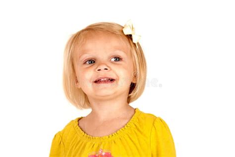 Cute Blond Girl Smiling Looking Away Stock Photo Image Of Happy