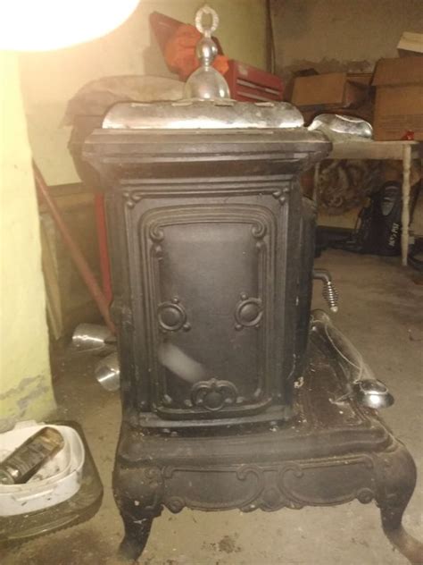 A wood stove that is sealed and used properly is no more dangerous than anything else in the shop that could cause a fire, like an electrical issue, nail going through a machine into a dust collector , spraying however, many years ago i had a coal burning stove in my house basement. Parlor cast iron wood burning stove made in Taiwan for ...