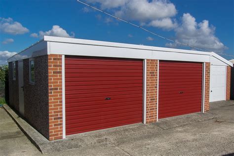 The garage ceiling is 11 ft tall to clear the stacked cars. Hollybush Buildings - Pent Roof Garages