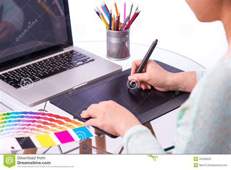 Cropped Image Of A Graphic Designer Using Graphic Tablet